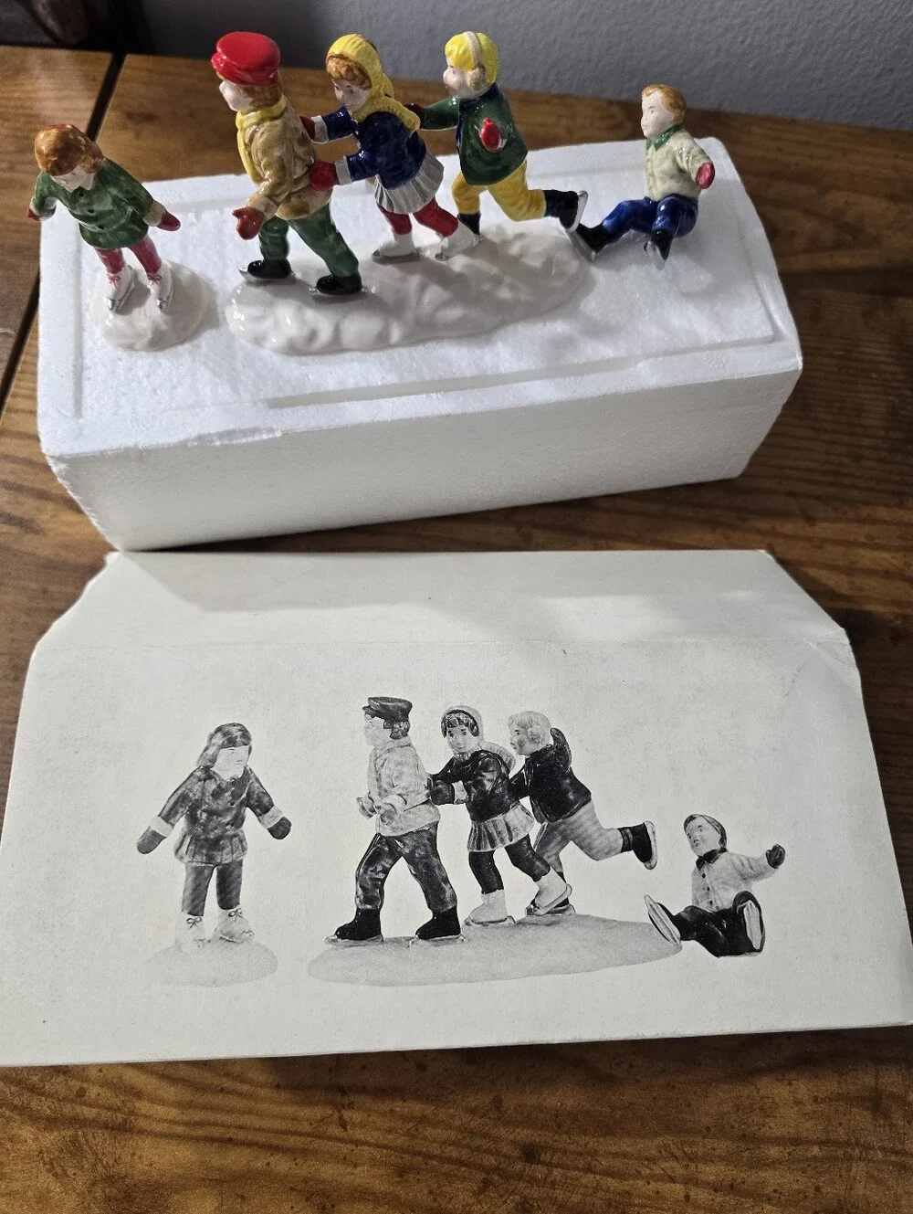 Department 56 Snow Village figurines titled 